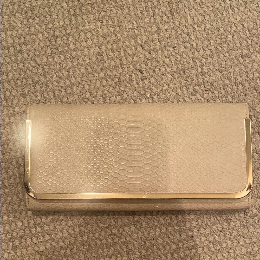 Elegant Cream Clutch with Gold Accents